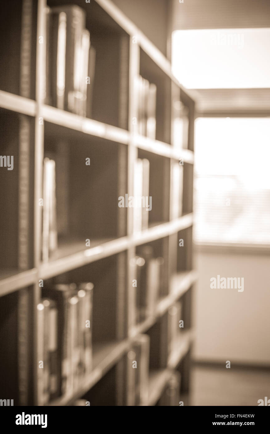 Bild von Bibliothek und Buch-Regal wissen, Bildungsforschung, Vintage Farbe Ton und Licht zu verwischen Stockfoto