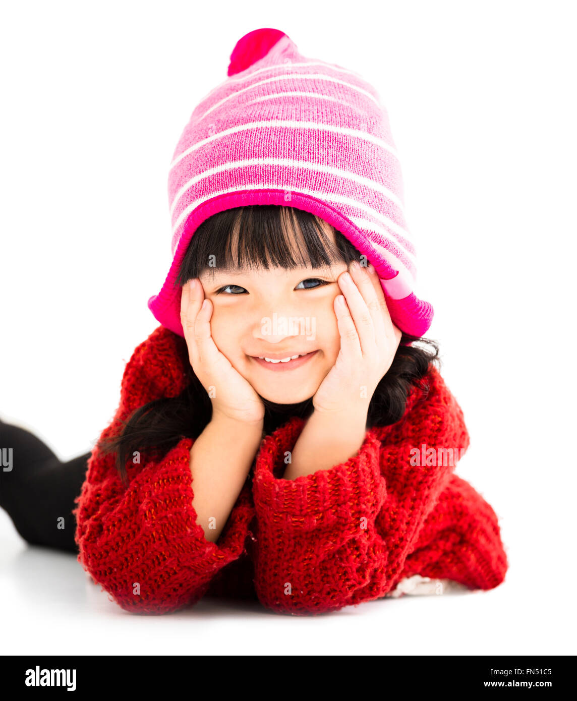 Glückliche kleine Mädchen in Winterkleidung Stockfoto