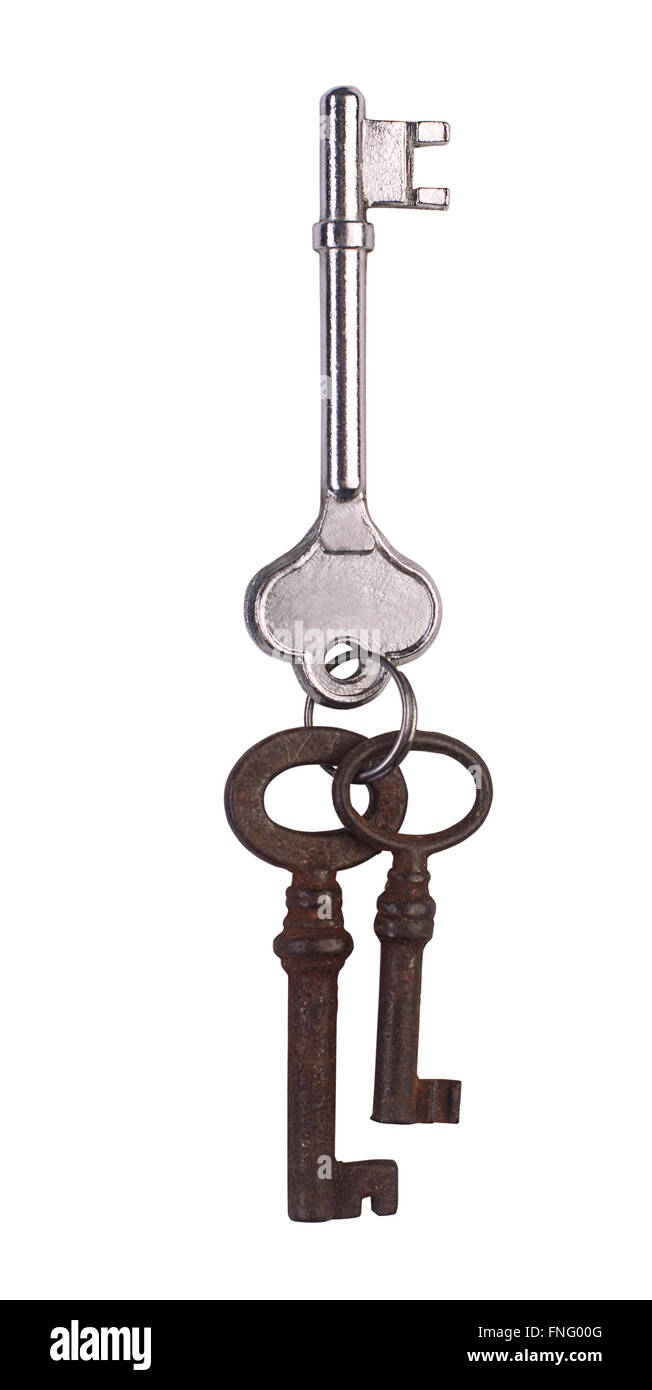 Einen silbernen Schlüssel und zwei verrostet sind. Stockfoto