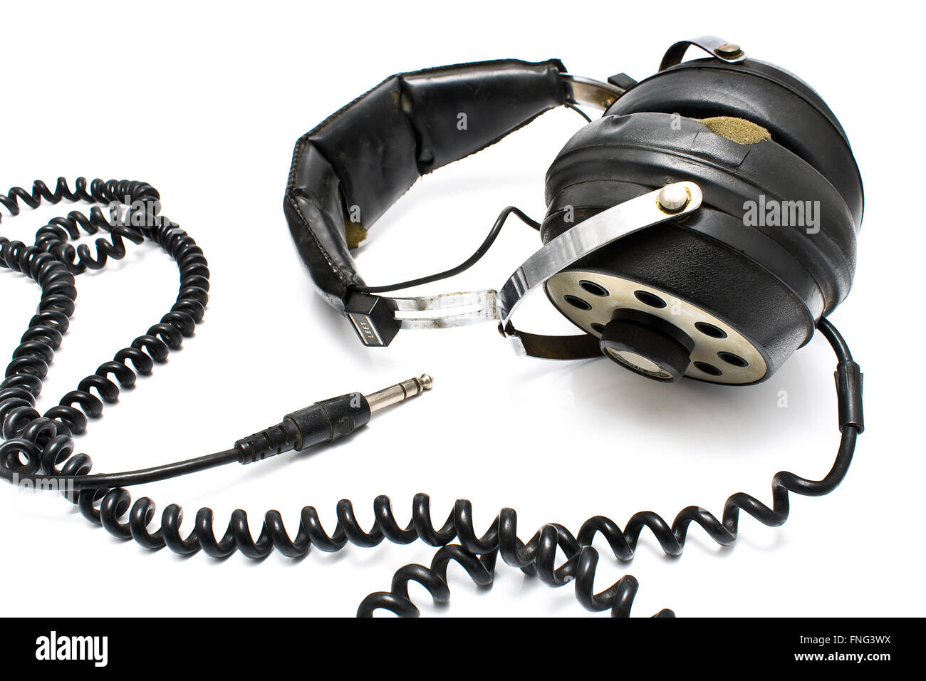 Koppeln von alten Kopfhörer isoliert auf einem weißen Stockfoto