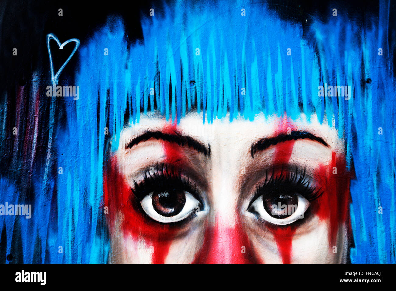 Graffiti-Gesicht an Wand, Poble sec, Barcelona, Spanien Stockfoto