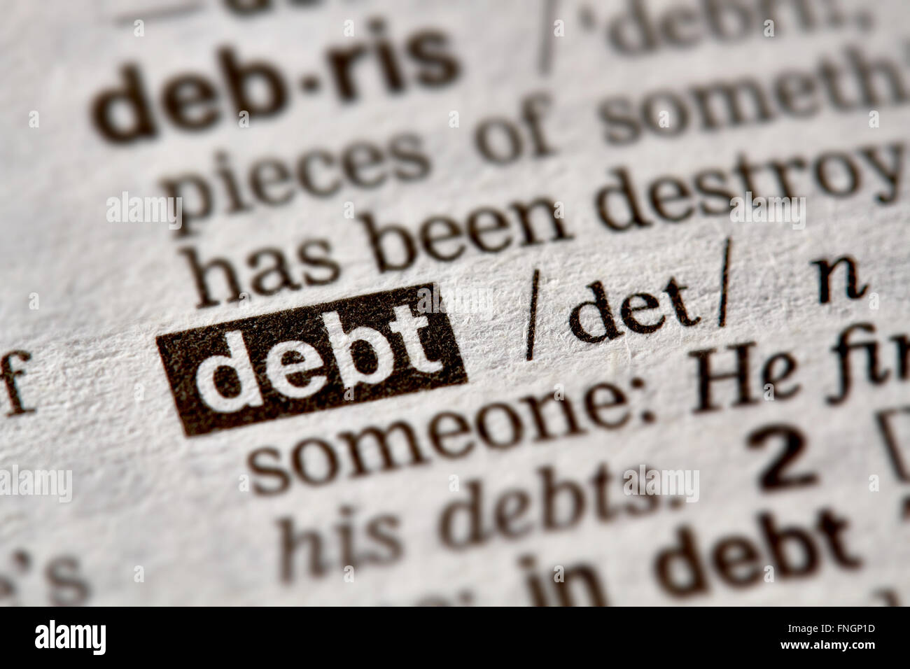 Schulden-Wort-Definition-Text im Wörterbuch Stockfoto