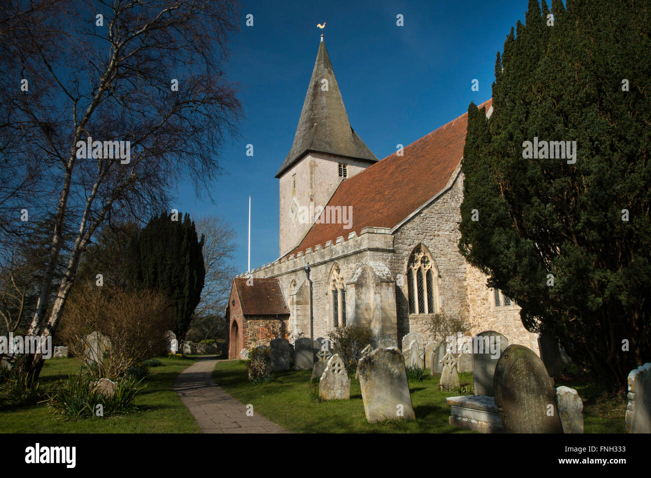 Dies ist die Holy Trinity Church in Bosham, West Sussex Stockfoto