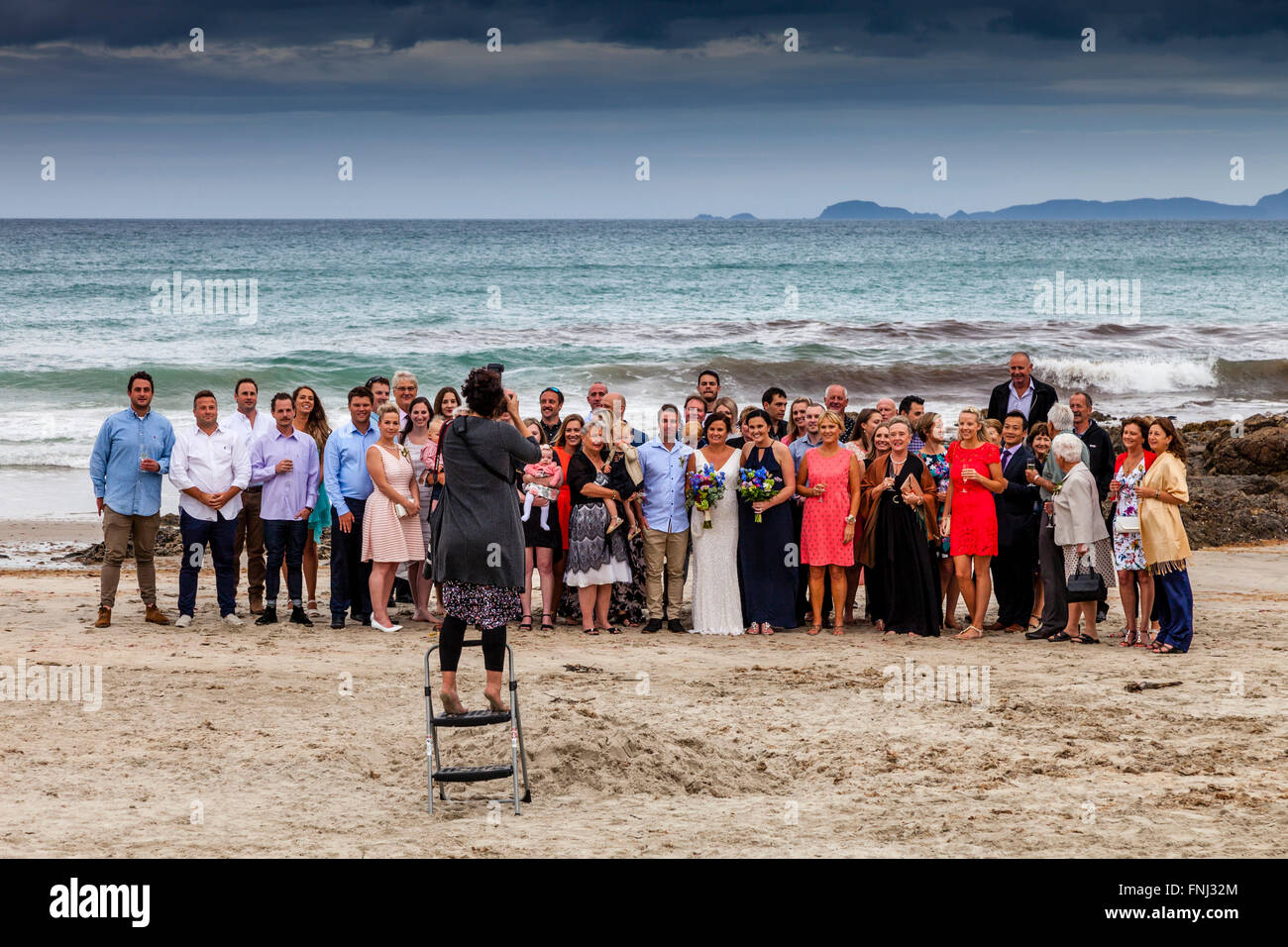 Eine Hochzeitsfeier an Waipu Cove, Waipu, Northland, Neuseeland Stockfoto