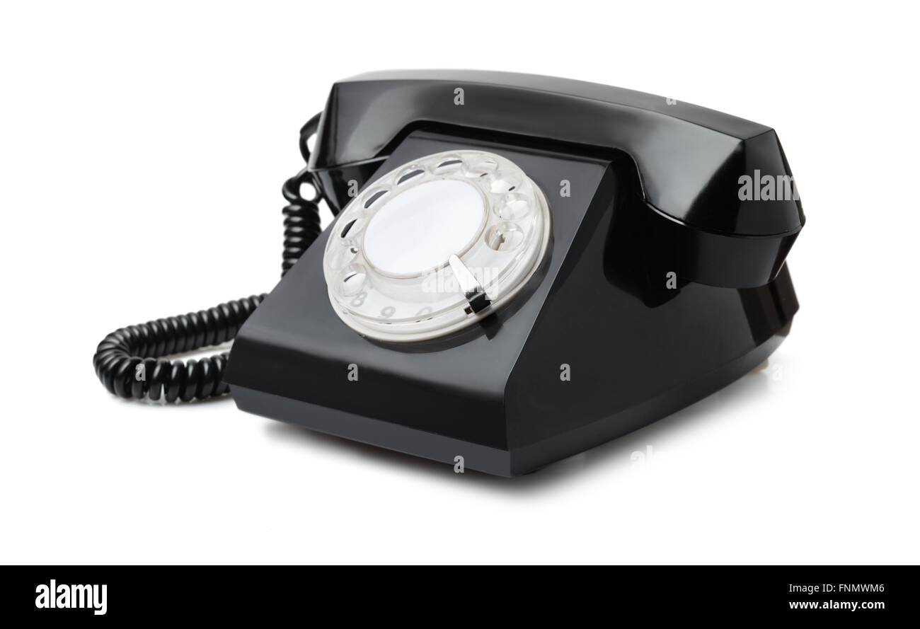 Alte schwarze Telefon mit Wählscheibe isoliert auf weiss Stockfoto