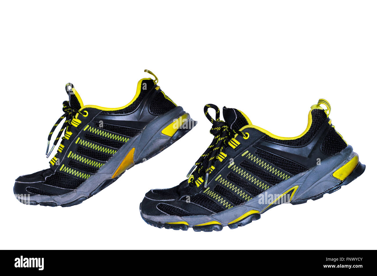 Schwarz und gelb gefärbt verwendet Laufschuhe, sport Stockfoto