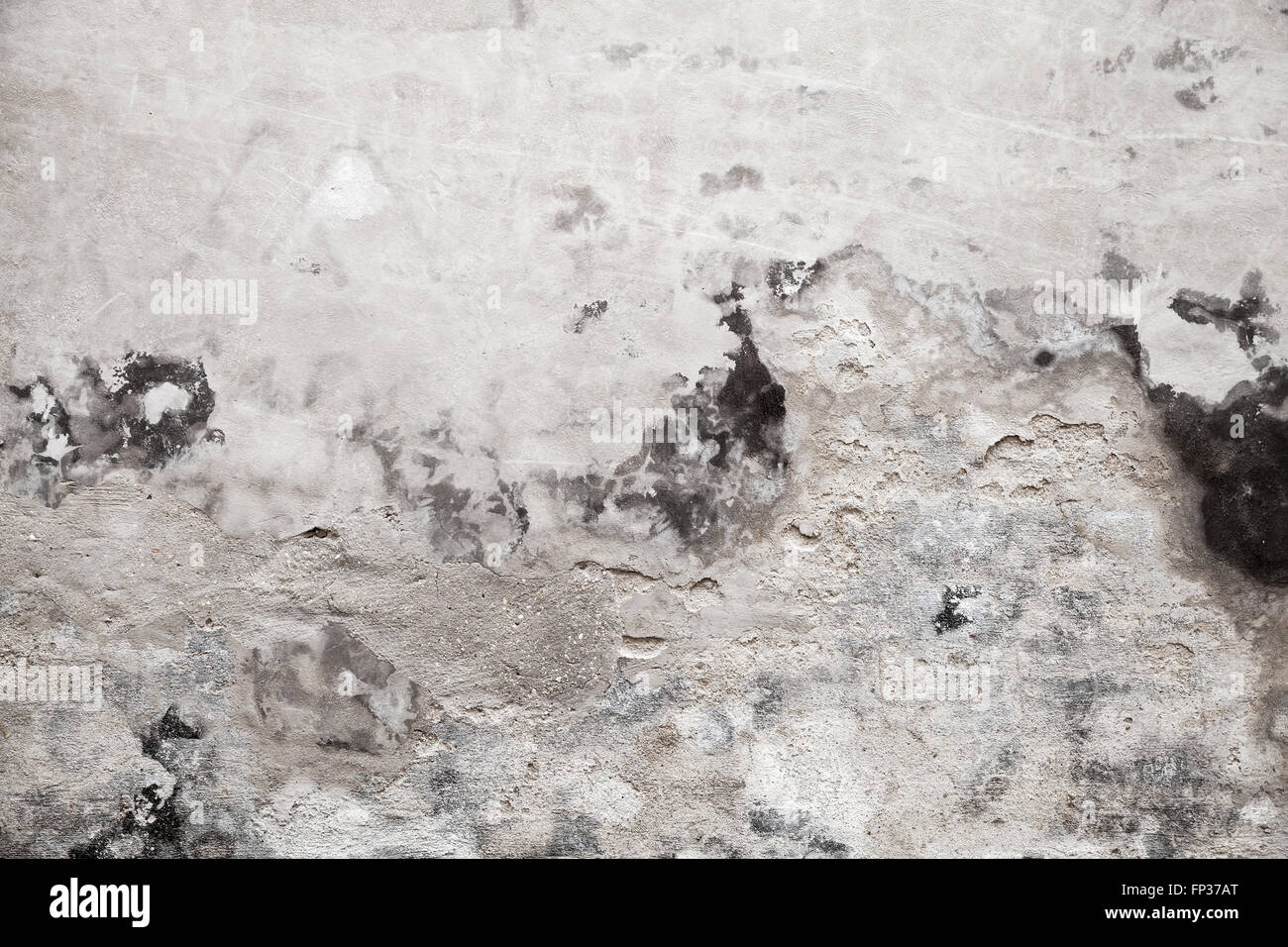 Hintergrundtextur alte Grunge Betonwand mit beschädigten Farbe und Stuck Schichten Stockfoto