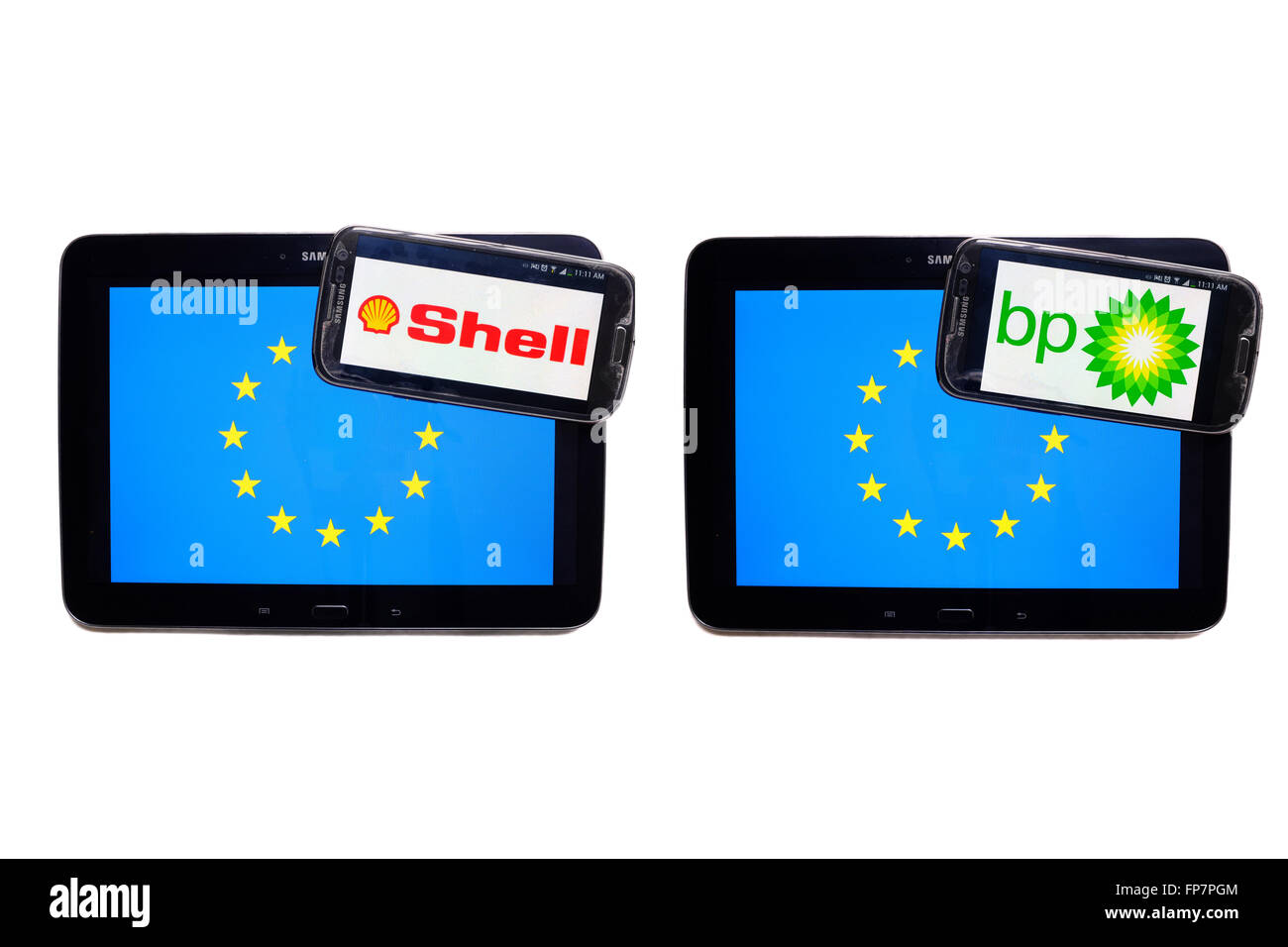 Die Logos der britischen Benzin-Unternehmen auf die Bildschirme von Smartphones, die auf der EU-Flagge angezeigt. Stockfoto