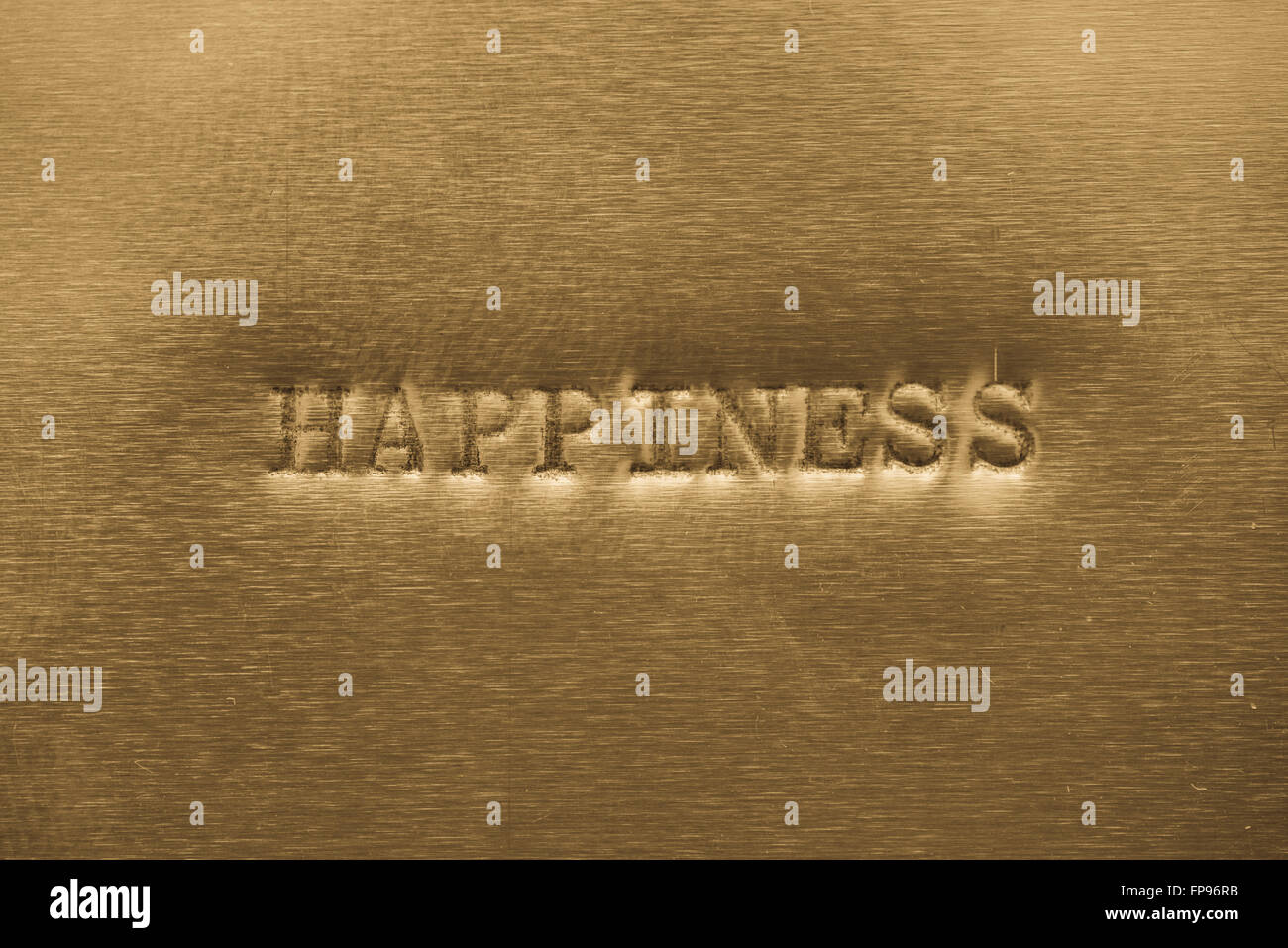 Wort-Glück auf Goldgrund metallic gedruckt Stockfoto