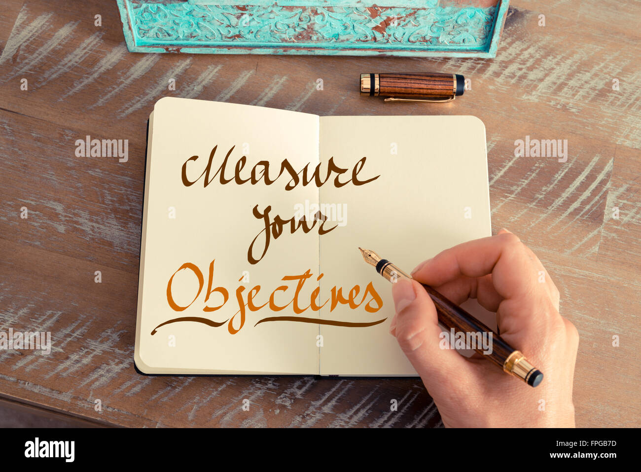 Handgeschriebener Text Maßnahme IHRE Ziele, Erfolg Geschäftskonzept Stockfoto