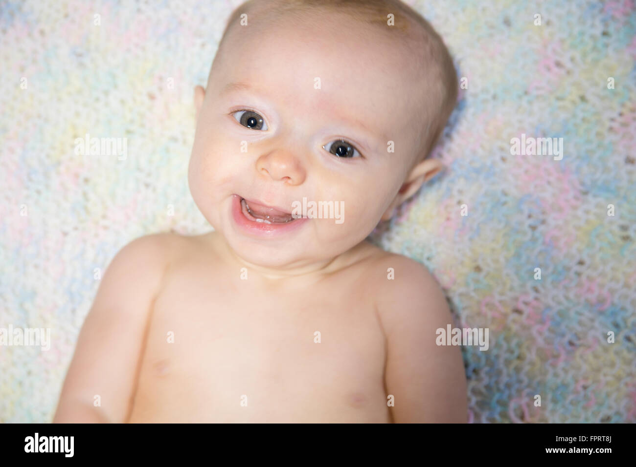 glückliches Babymädchen Stockfoto