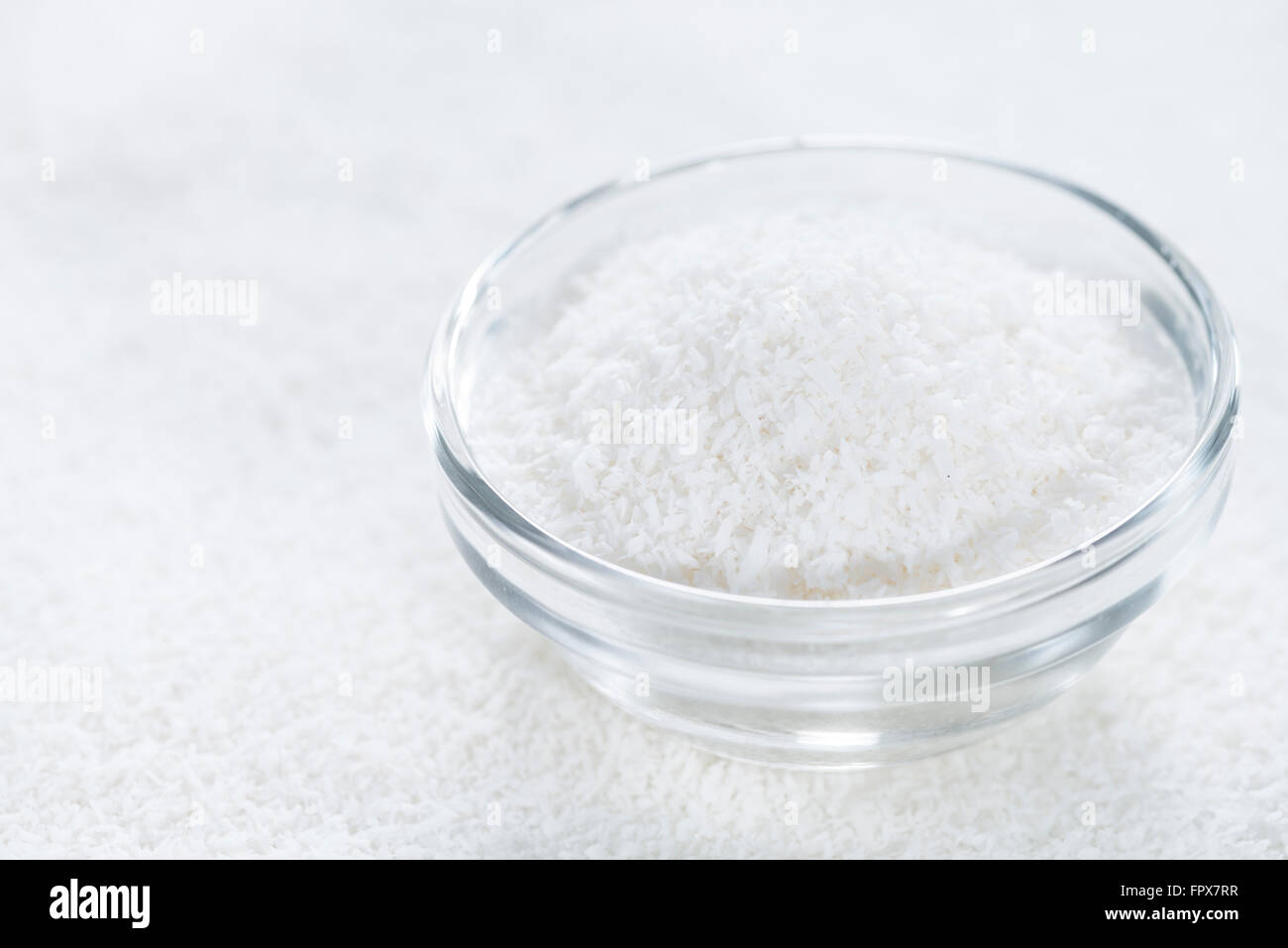 Kokosraspeln (zur Verwendung als Hintergrundbild oder als Textur als Nahaufnahme) Stockfoto