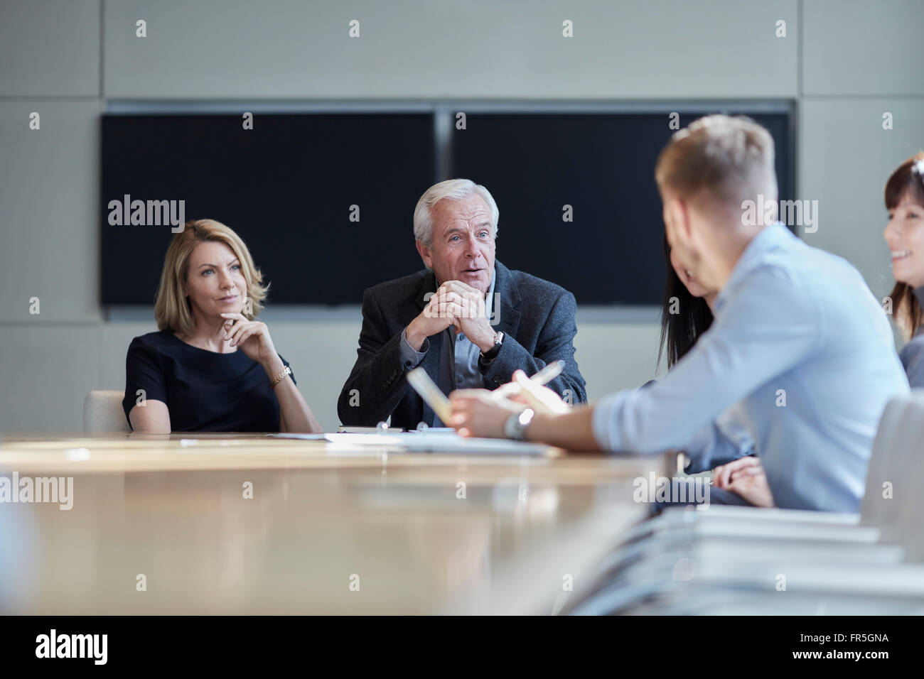 Business-Leute reden in treffen Stockfoto