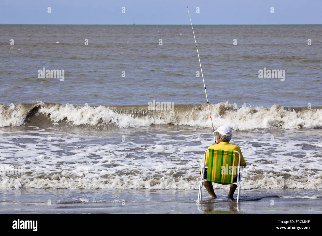 Fischer am Strand Costinha Stockfoto
