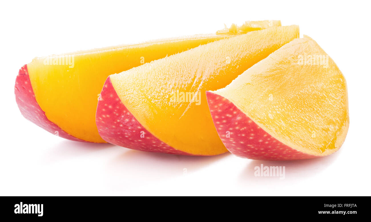 Mango-Frucht über weißen Scheiben. Stockfoto