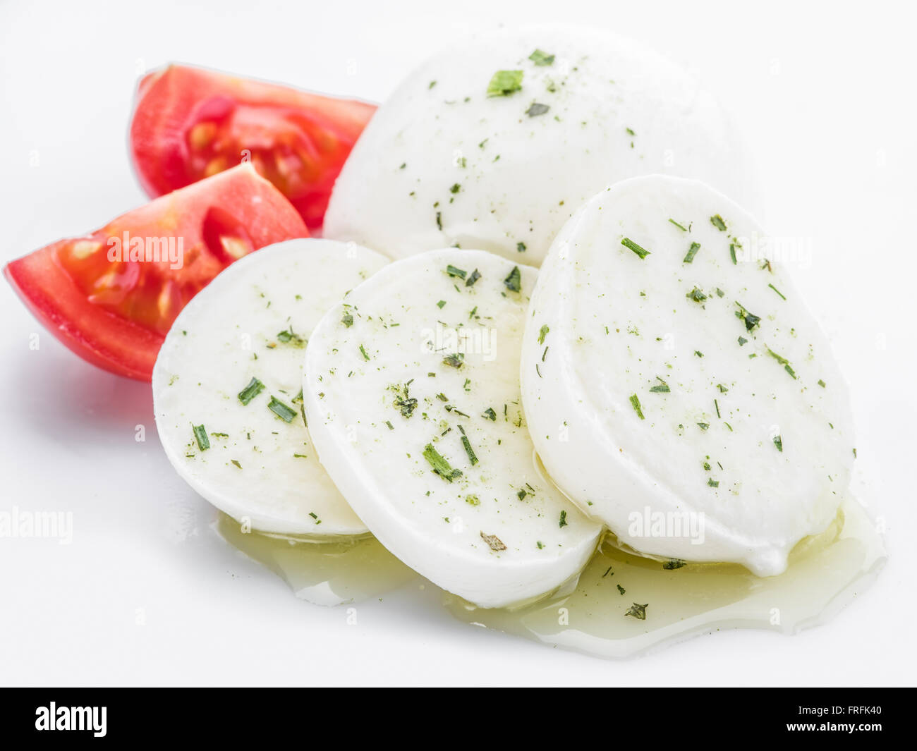 Mozzarella und Tomaten. Weißen Hintergrund. Stockfoto