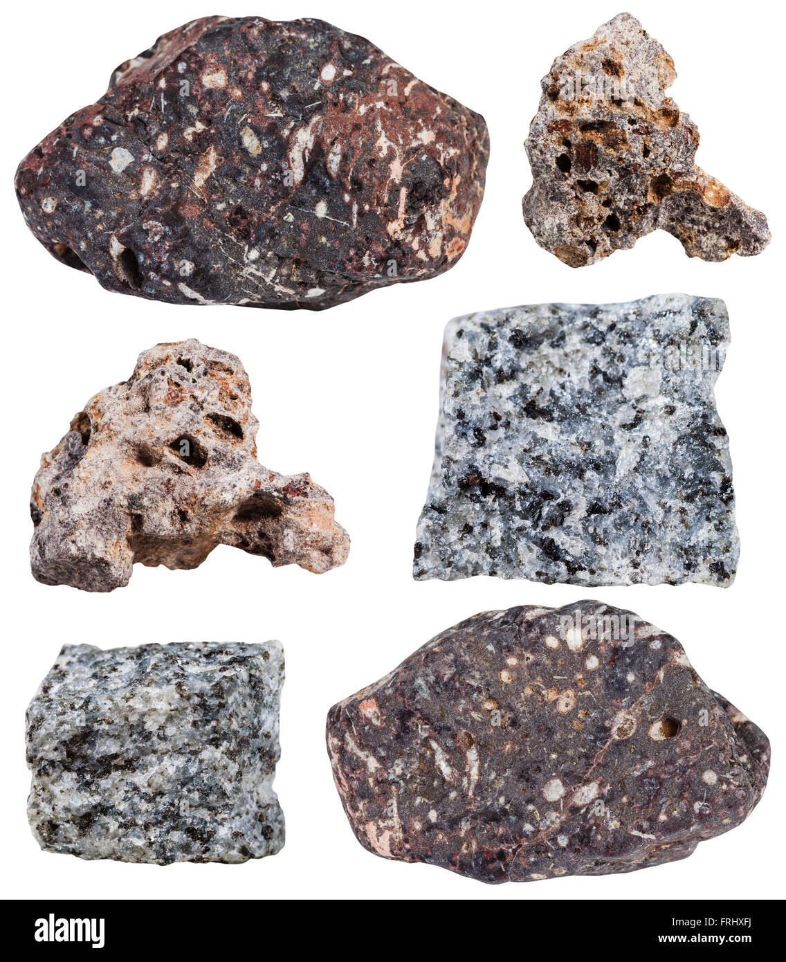 Reihe von verschiedenen mineralischen Basaltstein isoliert auf weißem Hintergrund Stockfoto