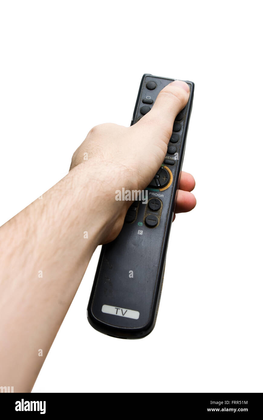 Hand, die eine alte TV-Fernbedienung über weißen isoliert Stockfoto