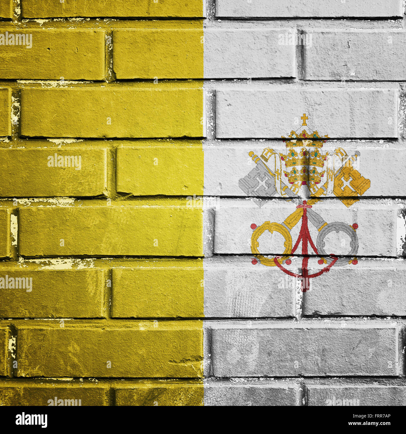 Vatikanstadt-Flagge auf der Mauer Stockfoto