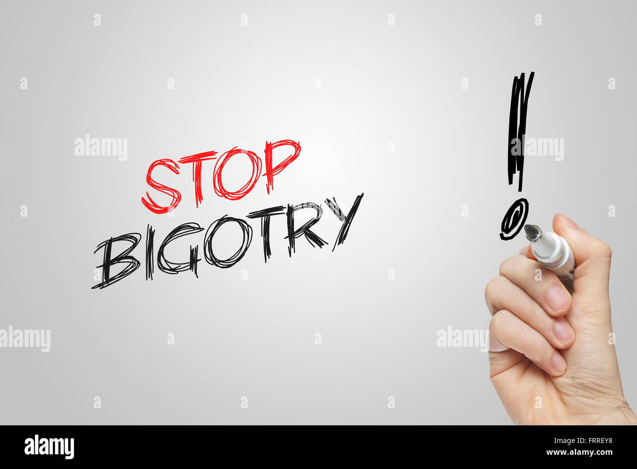 Handschrift Stop Bigotterie auf grauem Hintergrund Stockfoto