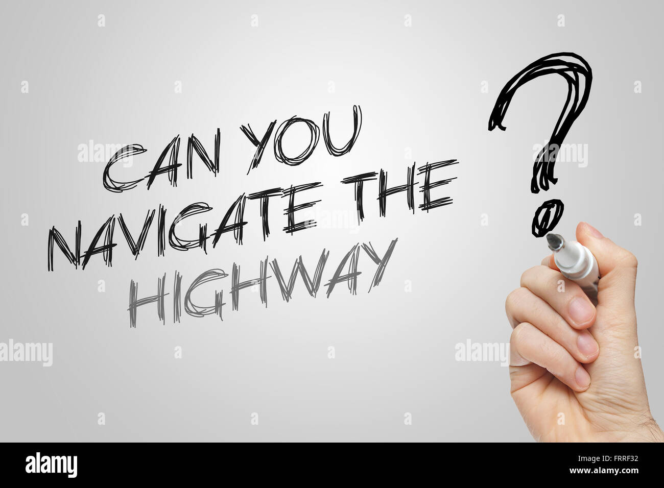 Handschrift, navigieren Sie die Autobahn auf grauem Hintergrund Stockfoto