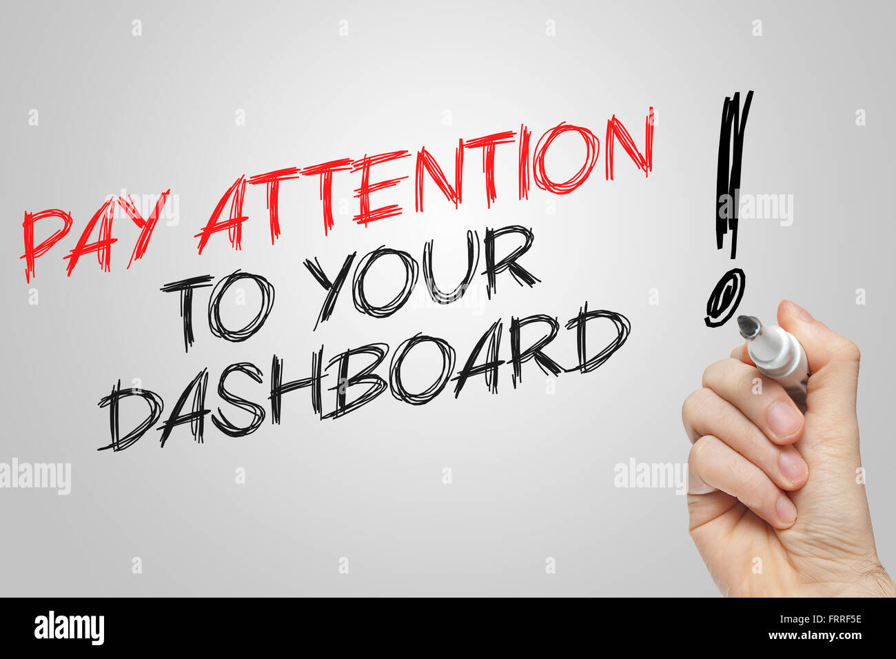 Handschrift achten Sie auf Ihrem Dashboard auf grauem Hintergrund Stockfoto