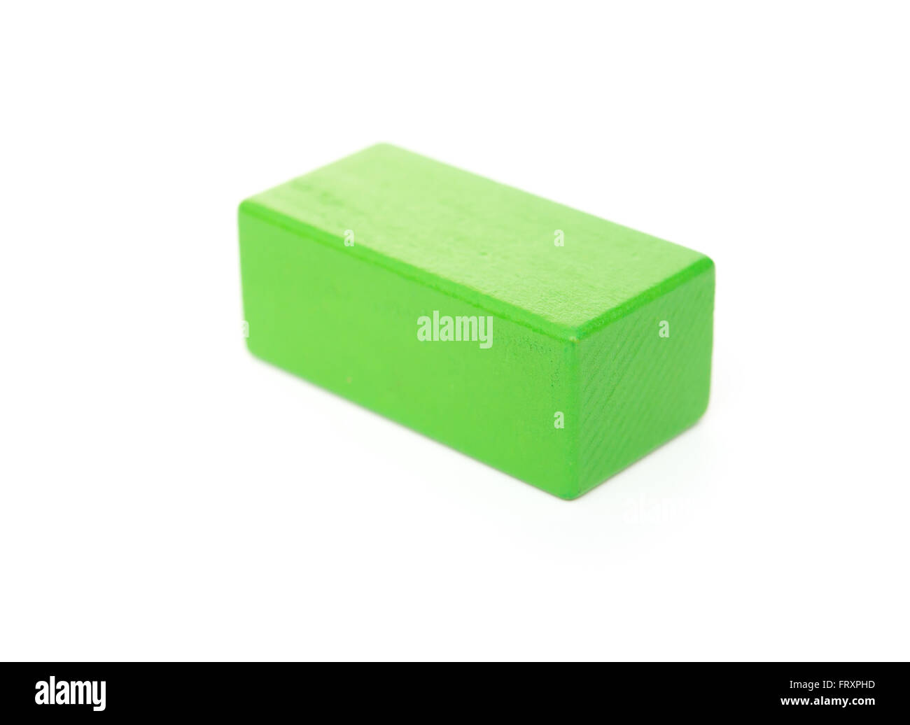 Stein grün Holzspielzeug auf weißem Hintergrund Stockfoto