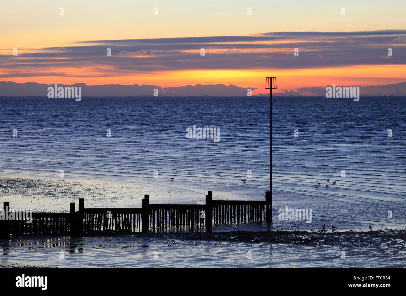 Sonnenuntergang am Strand von Heacham an der Küste von Norfolk. Stockfoto