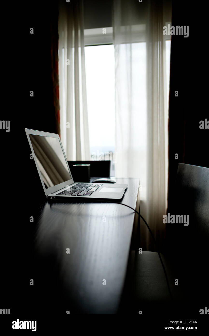 Apple MacBook Air auf dem Schreibtisch zu Hause Stockfoto