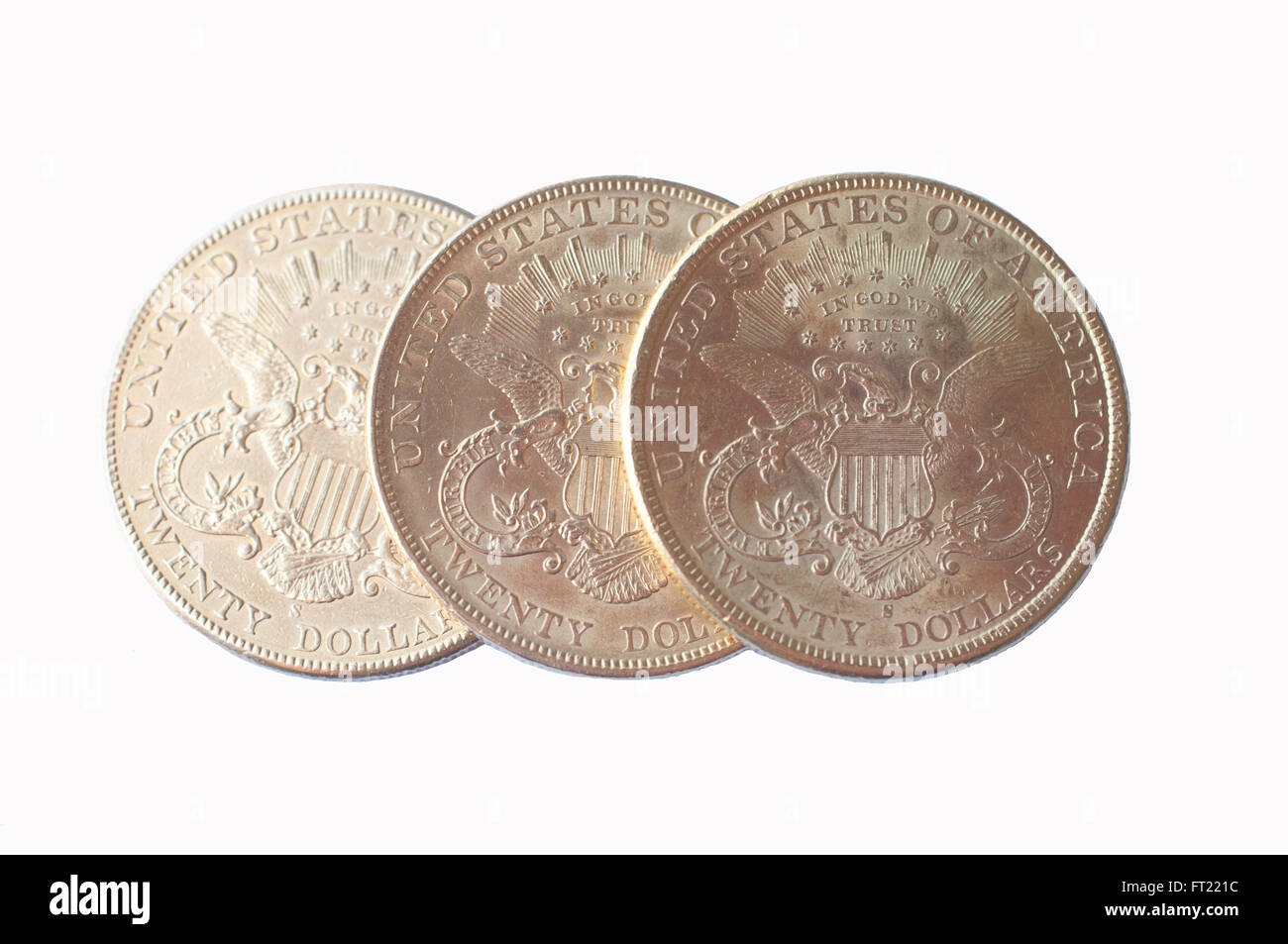 Drei US-American gold eagle eine Dollar-Münzen auf weißem Hintergrund Stockfoto