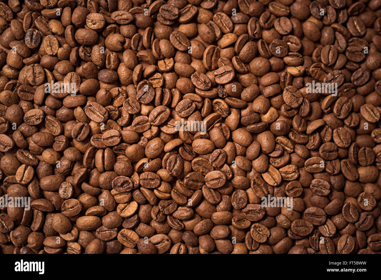 Kaffeebohnen-Hintergrund Stockfoto