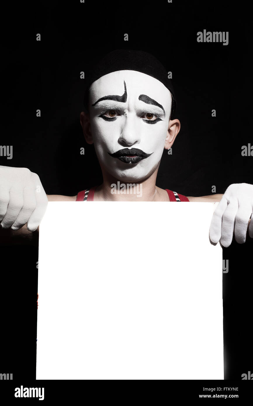 Porträt von Mime schmutzig weißen in den Händen halten Stockfoto