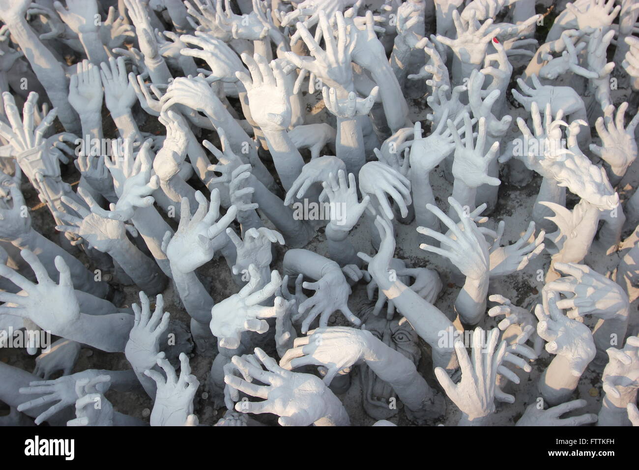 Reichenden Hände, Wat Rong Khun, Chiang Rai, Thailand Stockfoto