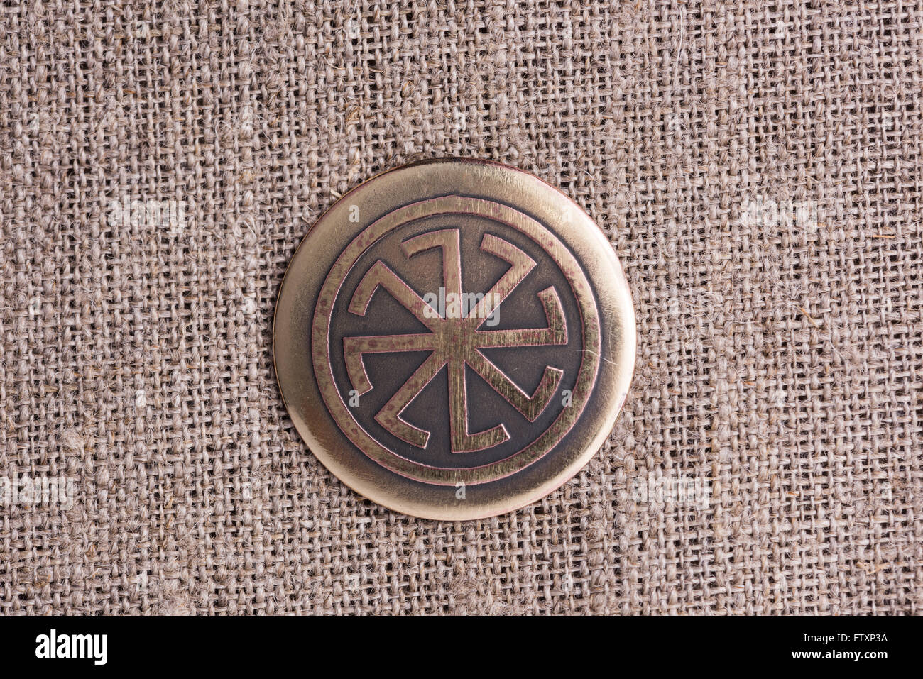 Kolyadniki und Kolovrat - ein Symbol der Sonne. Stockfoto