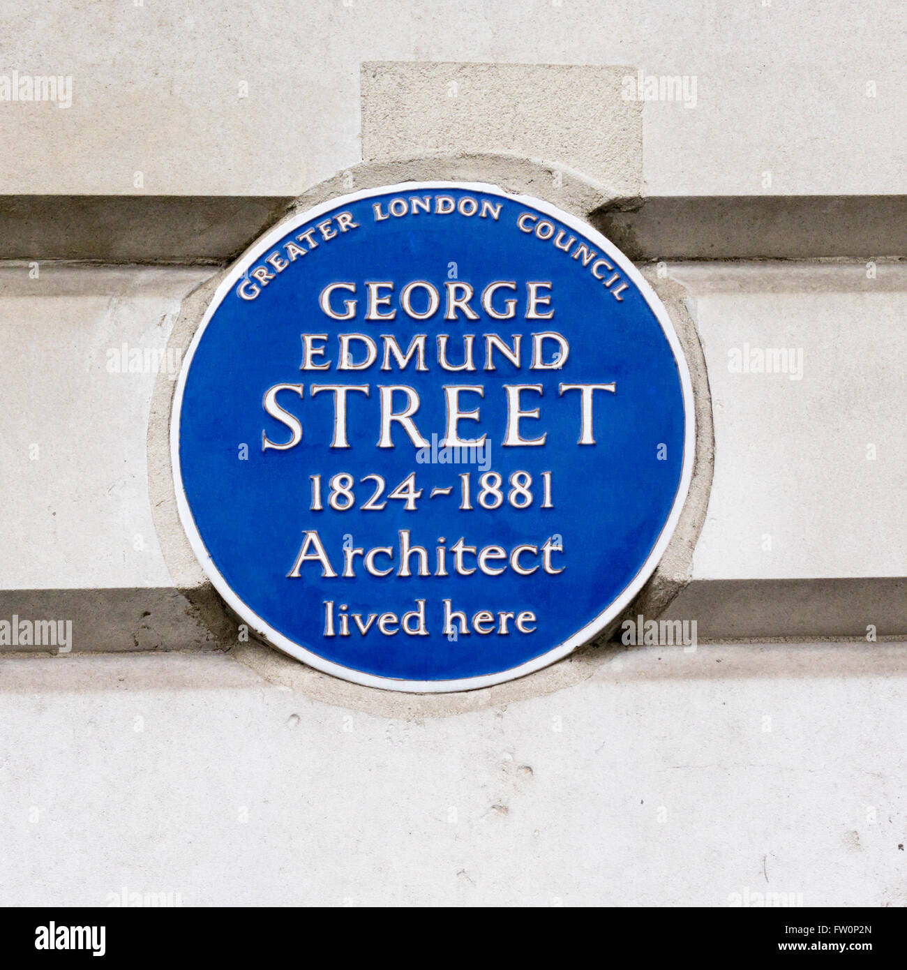 Blaue Plakette auf der Homepage des Architekten George Edmund Street in Cavendish Place, London. Stockfoto