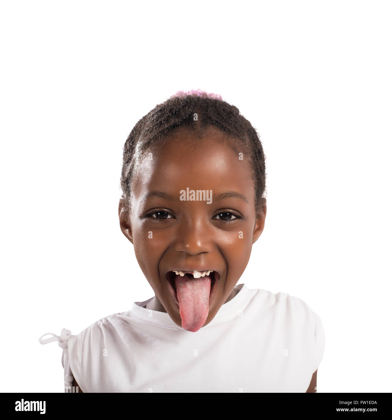 Kleines Mädchen macht eine Zunge Stockfoto