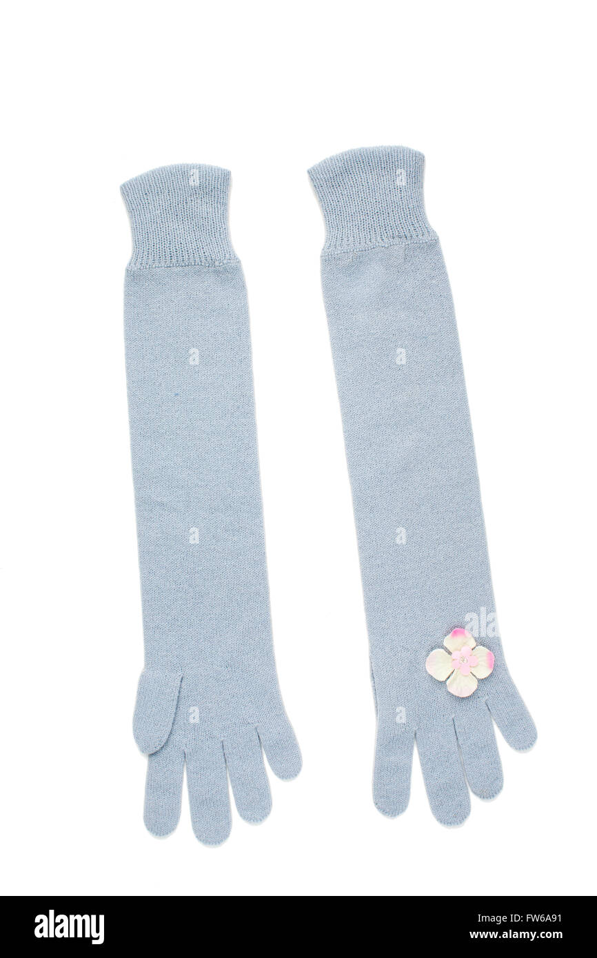 Blaue Handschuhe mit kleinen rosa Blüten Stockfoto