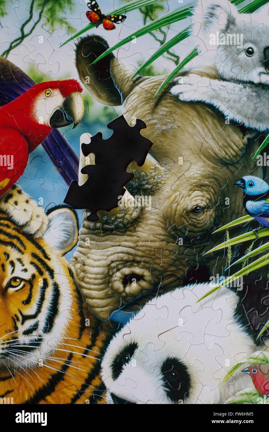 Ein Puzzle von einem Wildlife Szene mit der Rhino Horn fehlt. Stockfoto