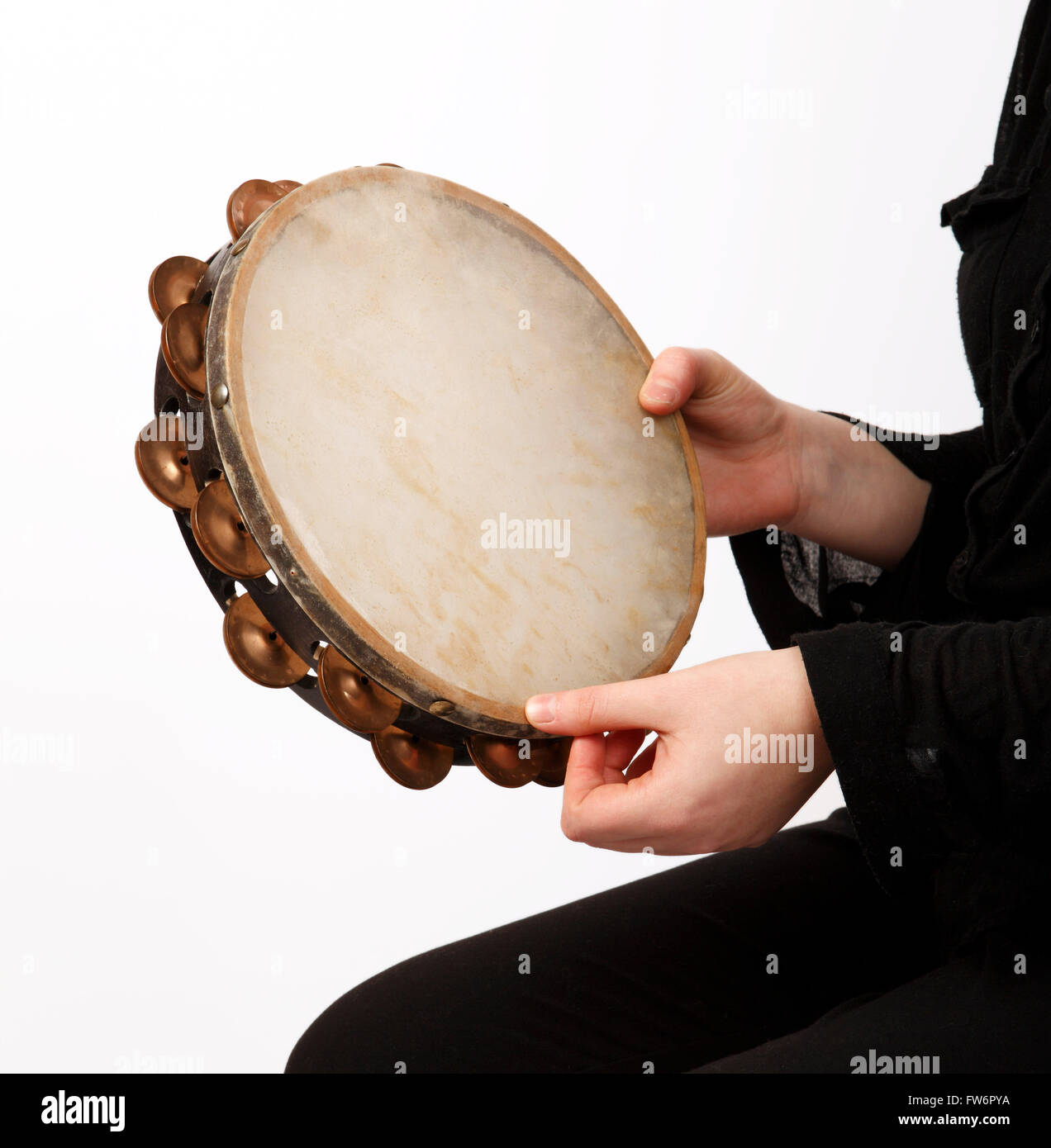Tamburin-Technik, ein Daumen Rollen in Spielposition. Stockfoto