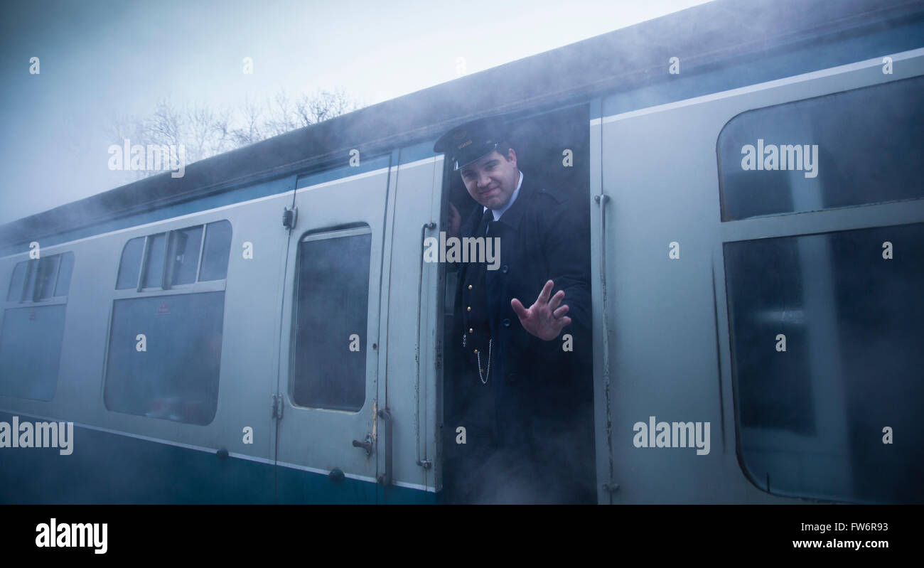 Zugführer, winken Stockfoto