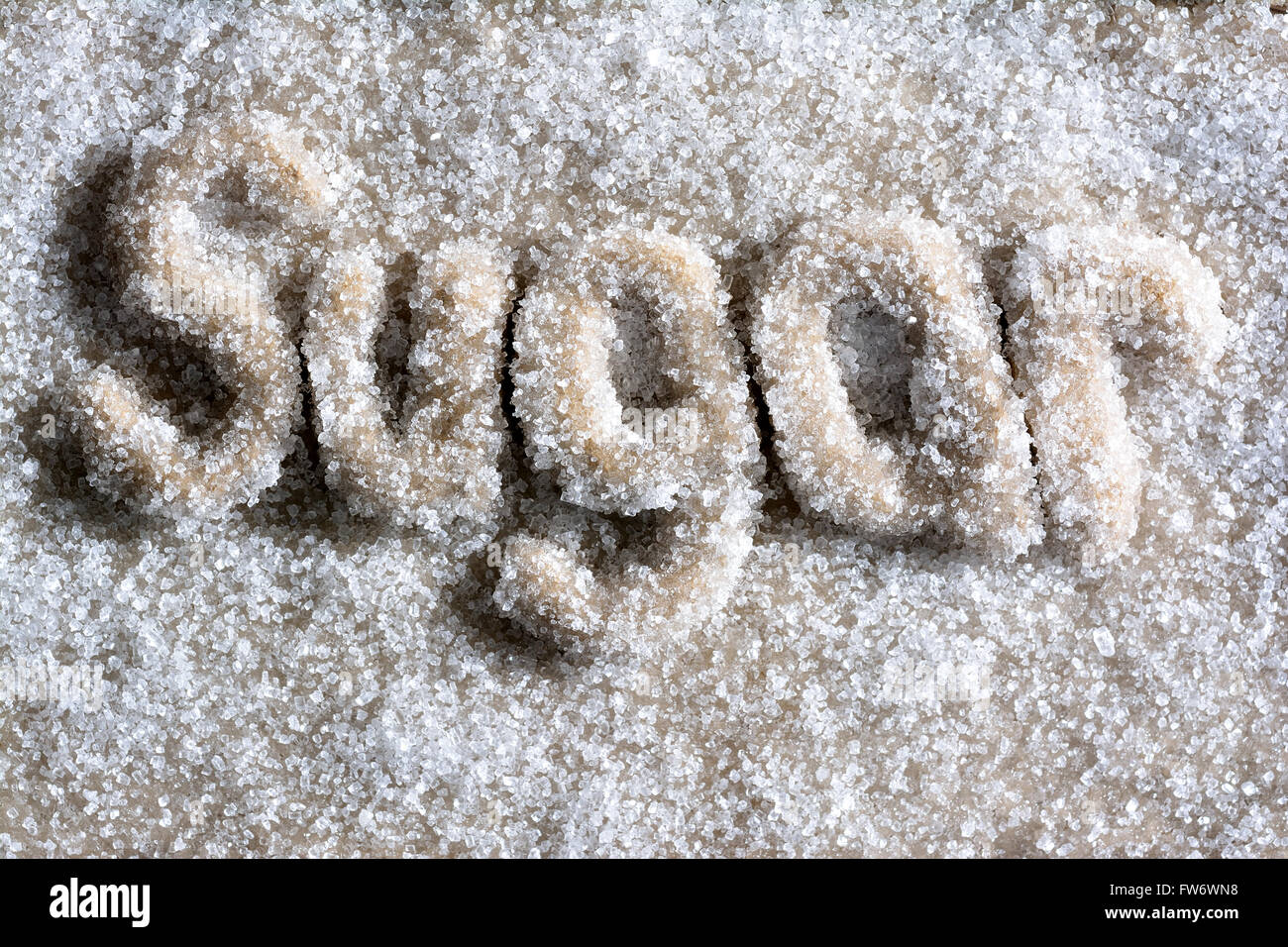Zuckerkristalle auf zuckerhaltige Gebäck Schriftzug Stockfoto