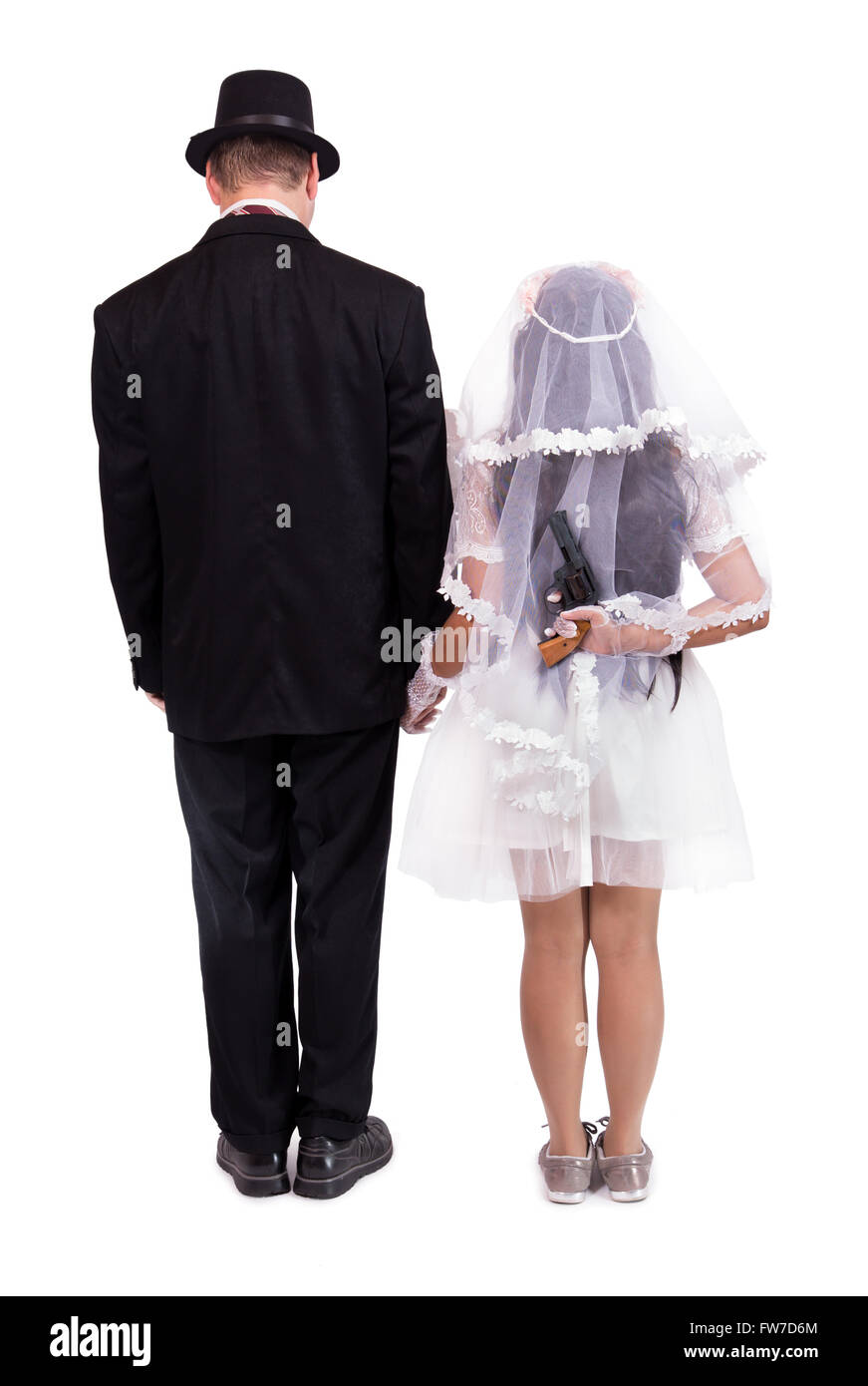 Braut mit Pistole bedroht ihr Bräutigam Stockfoto