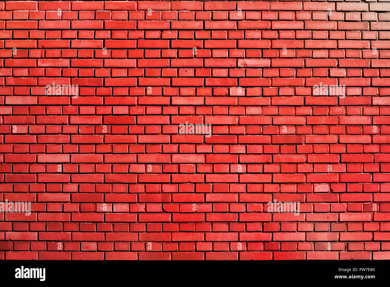 verwitterte aus rotem Backstein-Mauer-Hintergrund Stockfoto