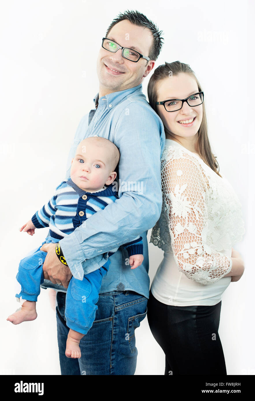 junge schöne Familie mit kleinen Jungen Stockfoto