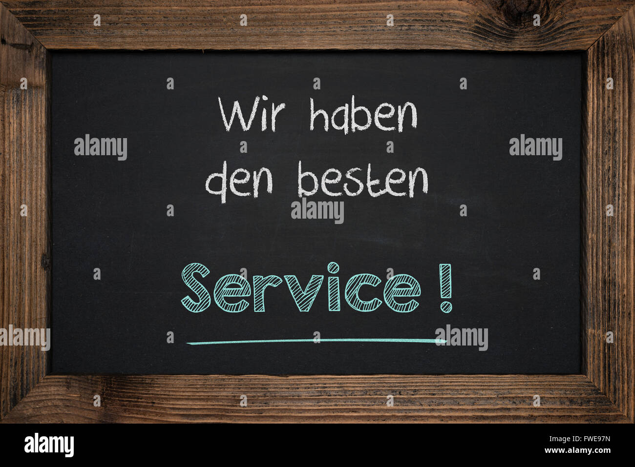 Tafel Handschrift Geschäftserfolg in deutscher Sprache. Stockfoto