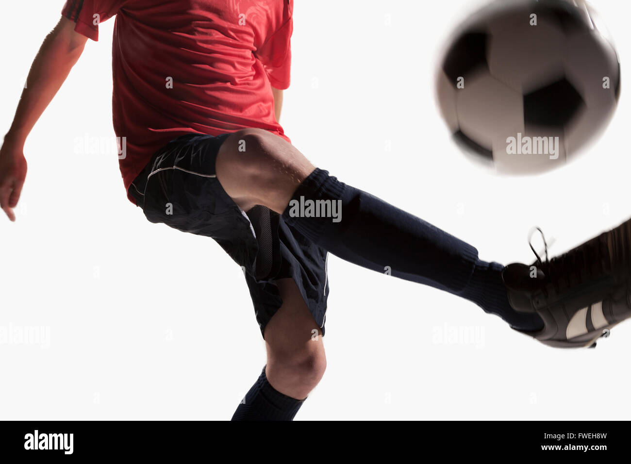 Fußball Spieler munter Fußball Stockfoto