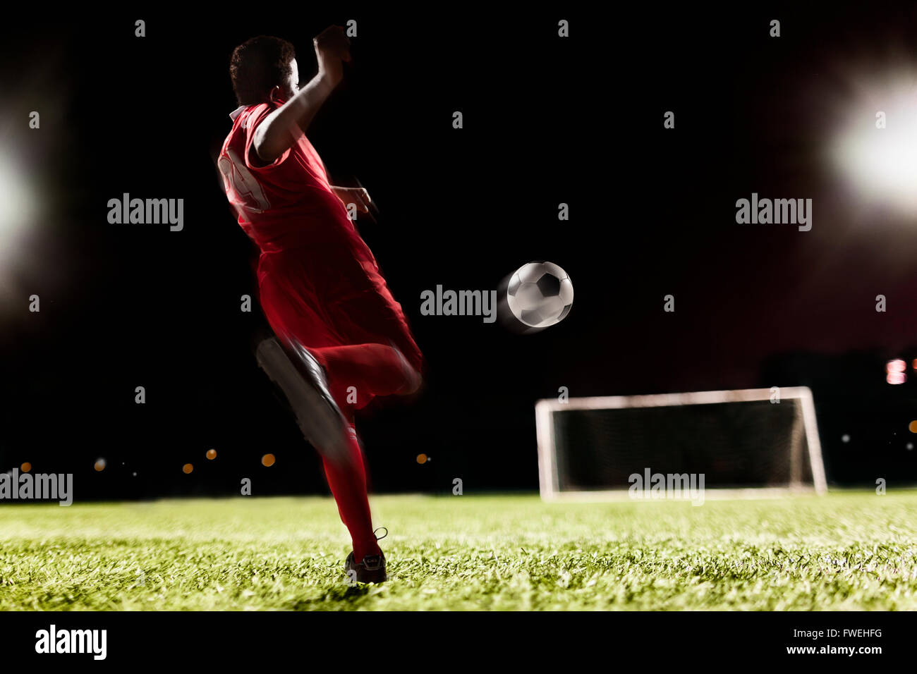 Fußball Spieler munter Fußball Stockfoto