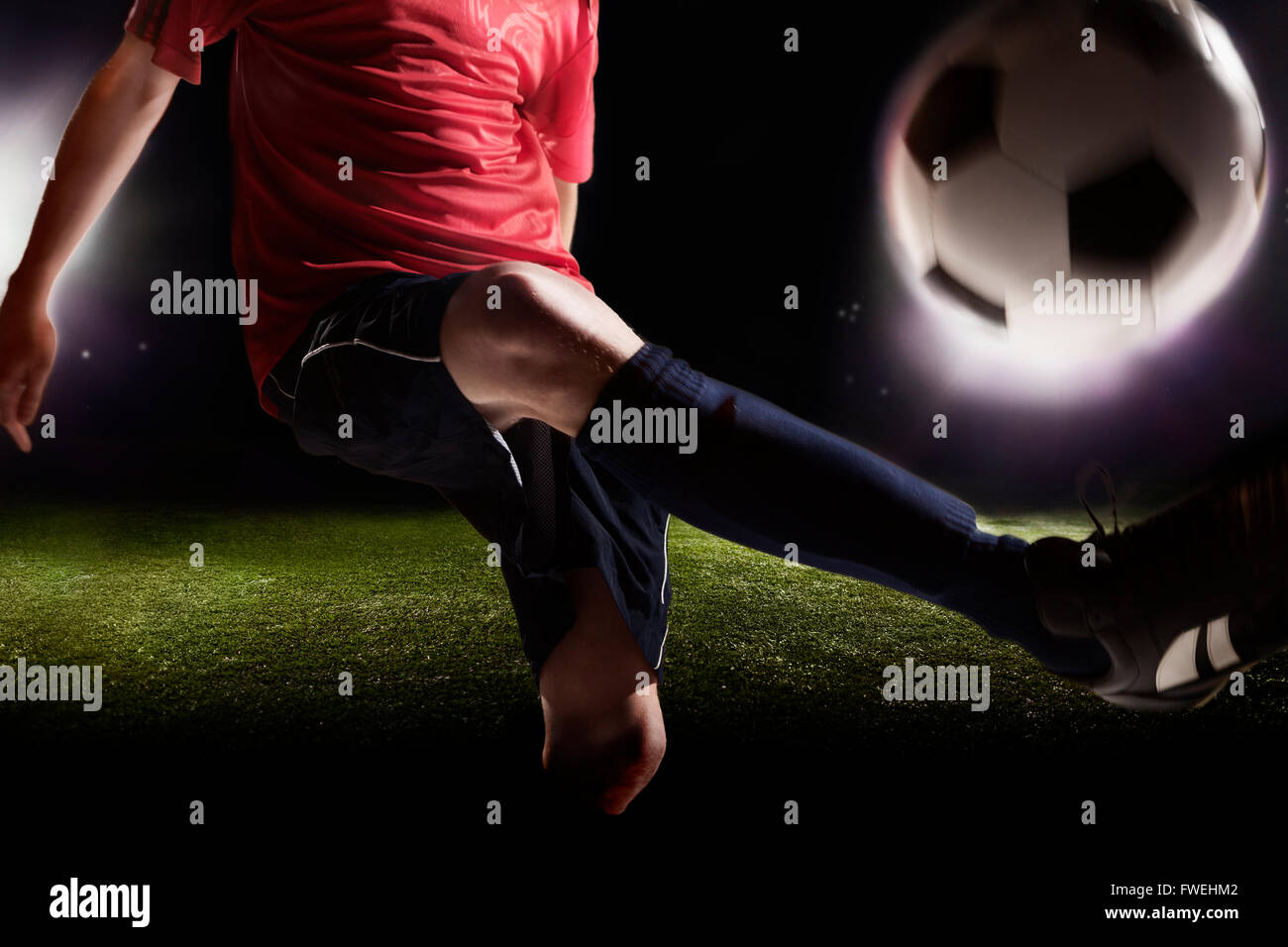 Fußball Spieler munter Fußball Stockfoto