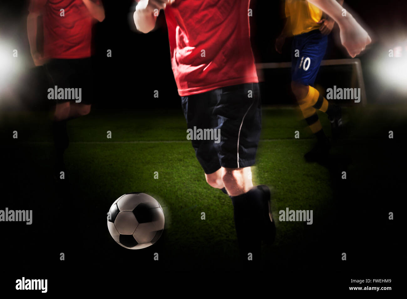 Fußball Spieler munter Fußball Stockfoto