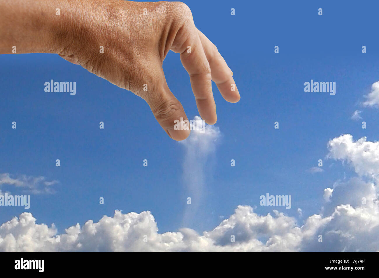 Hand fangen Wolke aus Brocken getrennt. Die seltsame Wolke. Stockfoto
